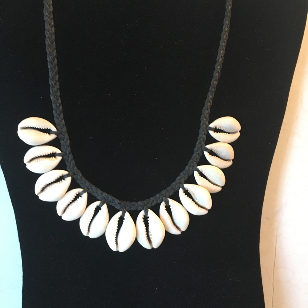 Cowrie shell and leather necklace